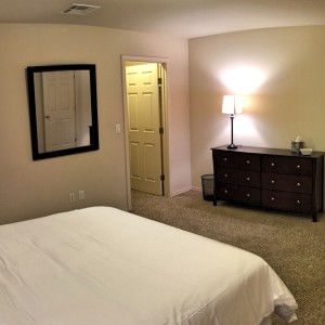 Master bedroom with ensuite bathroom and walk-in closet. - Las Alturas 1 - Alamogordo, NM house near Holloman AFB