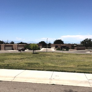 View out front door. Large field in neighborhood with plenty of room for activities. - Las Alturas 1 - Alamogordo, NM house near Holloman AFB